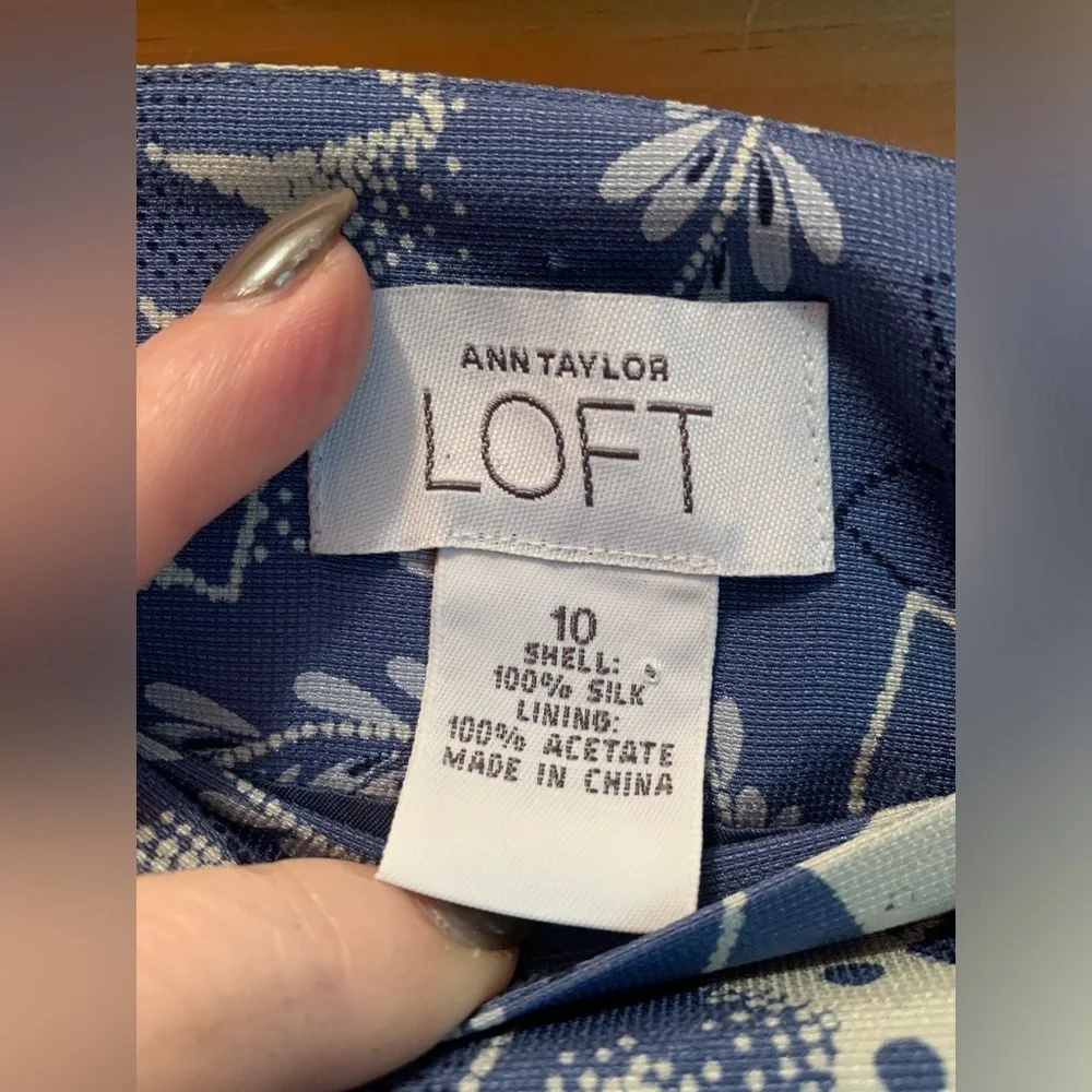 Ann Taylor loft, 100% silk blue and white skirt with side zipper. Size 10